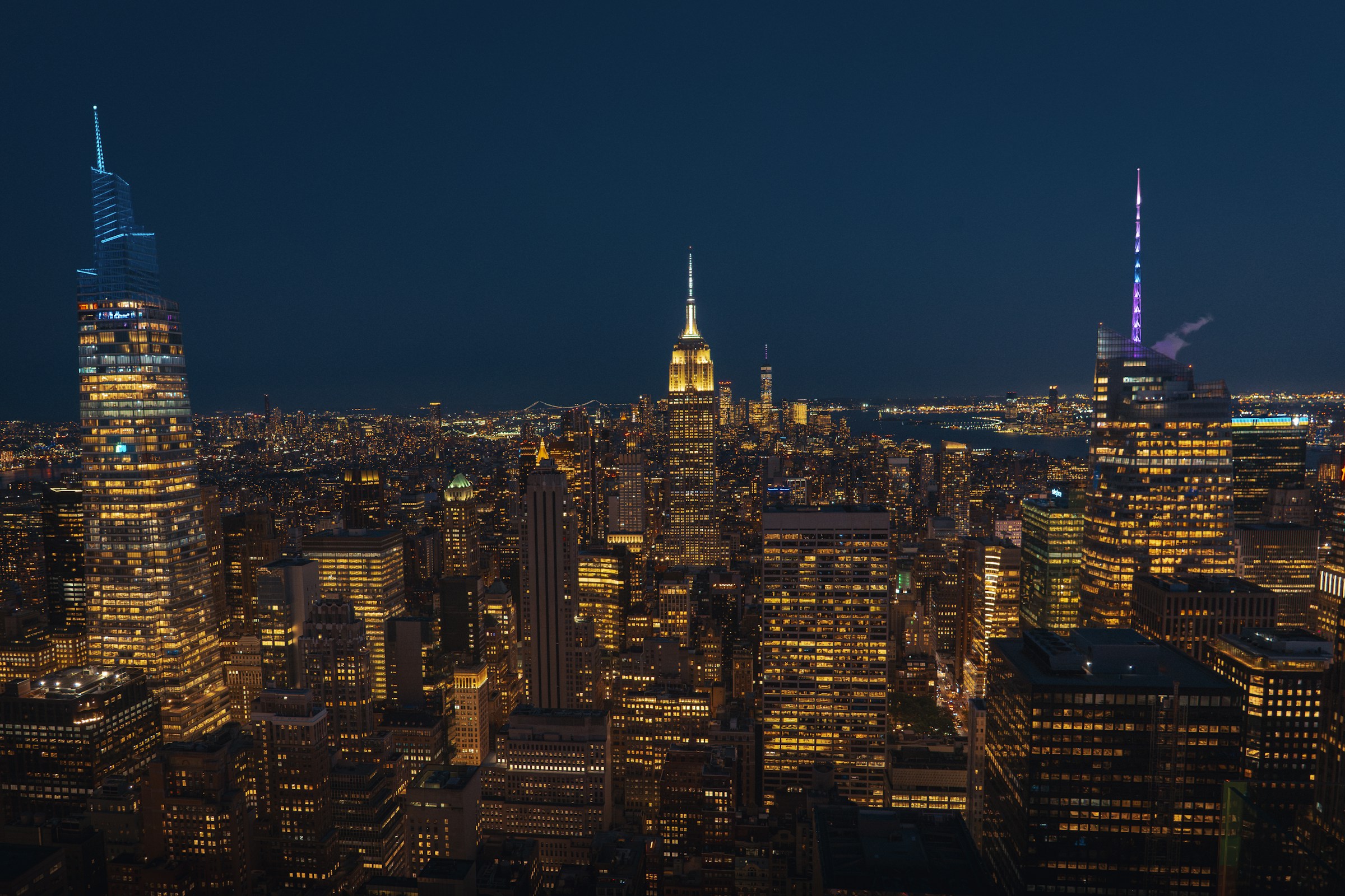 A city skyline illuminated at night